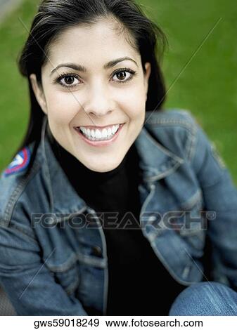 Portrait of a mid adult woman smiling View Large Photo Image Stock Photo - Portrait of a mid adult woman smiling. Fotosearch