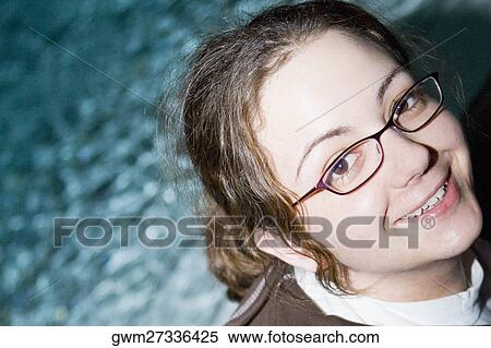 Portrait of a mid adult woman smiling View Large Photo Image Stock Photography - Portrait of a mid adult woman smiling. Fotosearch