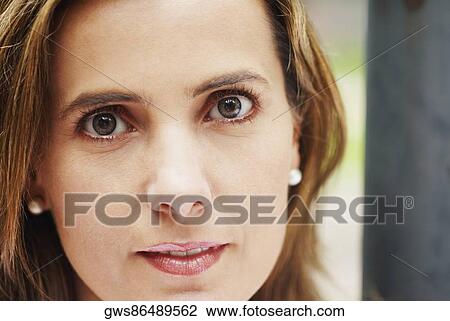 Portrait of a mid adult woman View Large Photo Image Stock Image - Portrait of a mid adult woman. Fotosearch