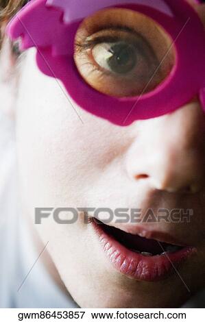 Stock Photo - Portrait of a mid adult woman wearing sunglasses. Fotosearch