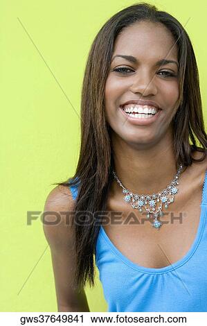 Portrait of a teenage girl smiling View Large Photo Image Stock Image - Portrait of a teenage girl smiling. Fotosearch