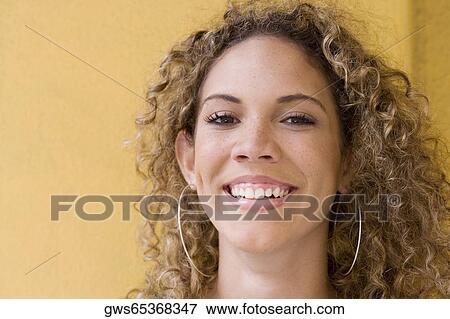 Portrait of a teenage girl smiling View Large Photo Image Stock Photo - Portrait of a teenage girl smiling. Fotosearch