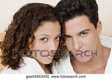 Stock Image - Portrait of a young man and a teenage girl. Fotosearch