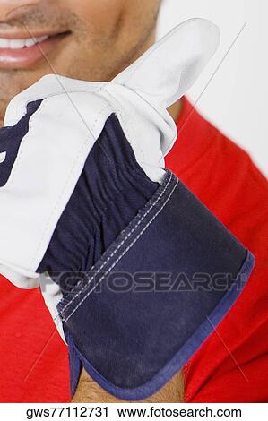 Portrait of a young man showing Thumbs Up sign View Large Photo Image Stock Image - Portrait of a young man showing Thumbs Up sign. Fotosearch