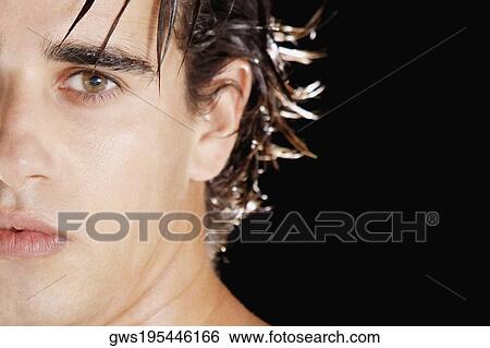 Portrait of a young man View Large Photo Image Stock Photograph - Portrait of a young man. Fotosearch