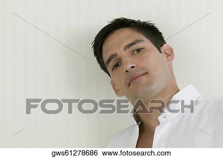 Portrait of a young man View Large Photo Image Stock Photograph - Portrait of a young man. Fotosearch