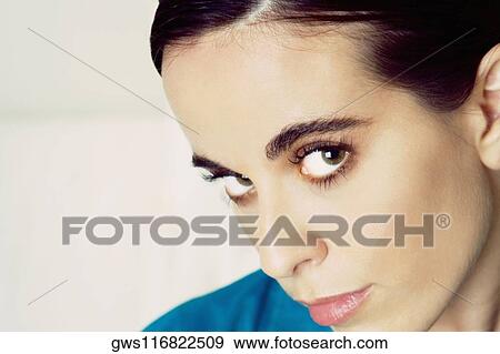 Portrait of a young woman View Large Photo Image Stock Photo - Portrait of a young woman. Fotosearch