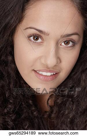 Portrait of a young woman View Large Photo Image Stock Photo - Portrait of a young woman. Fotosearch