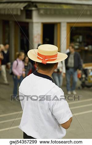 Rear view of a man standing View Large Photo Image Stock Photo - Rear view of a man standing. Fotosearch