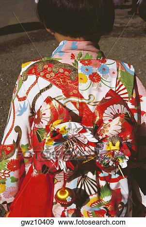 Rear view of a woman wearing kimono, Tokyo Prefecture, Japan View Large Photo Image Stock Photo - Rear view of a woman wearing kimono, Tokyo Prefecture, Japan. Fotosearch
