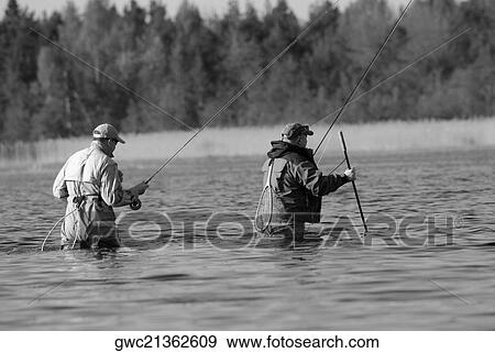 Rear view of two mature men fishing in the river View Large Photo Image Stock Photo - Rear view of two mature men fishing in the river. Fotosearch