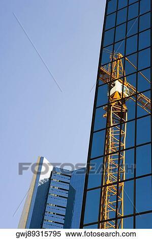 Reflection of a crane on a building, Miami, Florida, USA View Large Photo Image Stock Photography - Reflection of a crane on a building, Miami, Florida, USA. Fotosearch