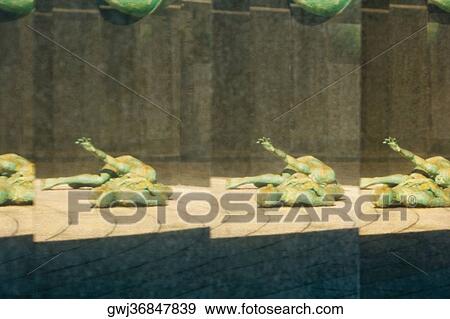 Stock Photo - Reflection of a statue. Fotosearch
