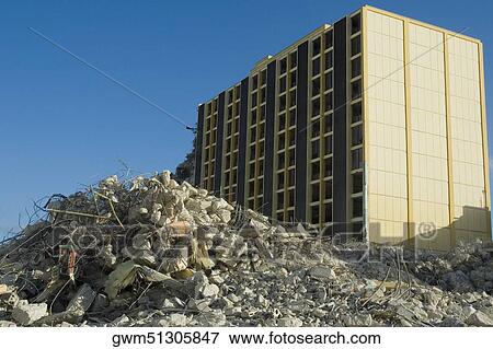 Rubble in front of a building View Large Photo Image Stock Photo - Rubble in front of a building. Fotosearch