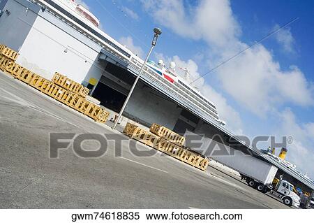 Stock Photography - Semi-truck at a shipping port. Fotosearch