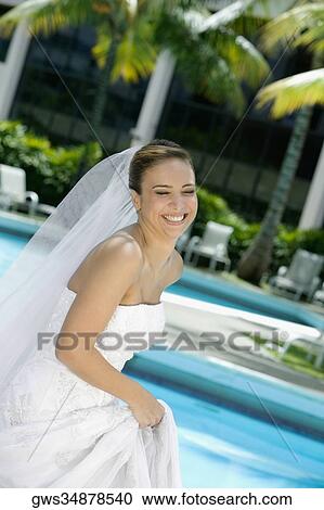 Side profile of a bride smiling View Large Photo Image Stock Image - Side profile of a bride smiling. Fotosearch