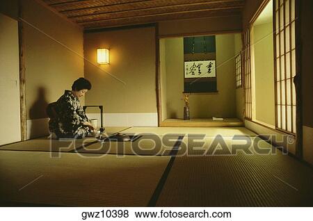 Side profile of a woman drinking tea, Tokyo Prefecture, Japan View Large Photo Image Stock Photo - Side profile of a woman drinking tea, Tokyo Prefecture, Japan. Fotosearch