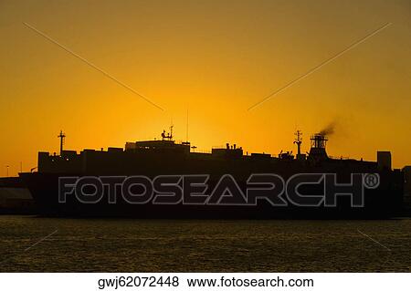Silhouette of a ferry at dusk, Miami, Florida, USA View Large Photo Image Stock Photo - Silhouette of a ferry at dusk, Miami, Florida, USA. Fotosearch