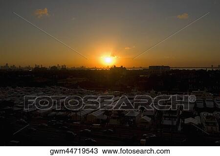 Sunset over a city View Large Photo Image Stock Image - Sunset over a city. Fotosearch