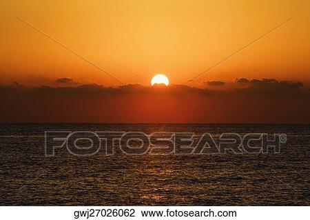 Sunset over the sea, Miami, Florida, USA View Large Photo Image Stock Image - Sunset over the sea, Miami, Florida, USA. Fotosearch