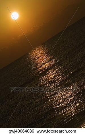 Sunset over the sea, Miami, Florida, USA View Large Photo Image Stock Photograph - Sunset over the sea, Miami, Florida, USA. Fotosearch