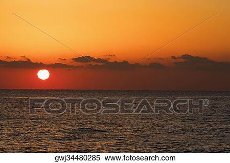 Sunset over the sea, Miami, Florida, USA View Large Photo Image Stock Photography - Sunset over the sea, Miami, Florida, USA. Fotosearch