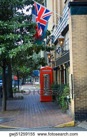 Stock Photography - Telephone booth outside a building. Fotosearch