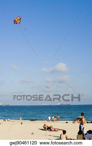 Tourist on the beach View Large Photo Image Stock Image - Tourist on the beach. Fotosearch