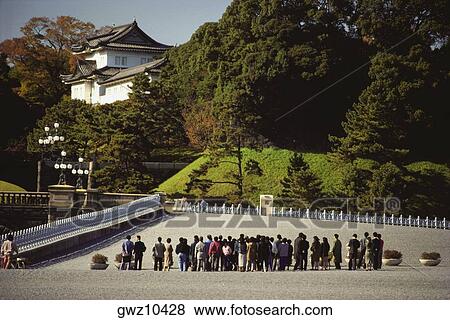 Tourists standing on a bridge near a palace, Nijubashi Bridge, Imperial Palace, Tokyo Prefecture, Japan View Large Photo Image Stock Photo - Tourists standing on a bridge near a palace, Nijubashi Bridge, Imperial Palace, Tokyo Prefecture, Japan. Fotosearch