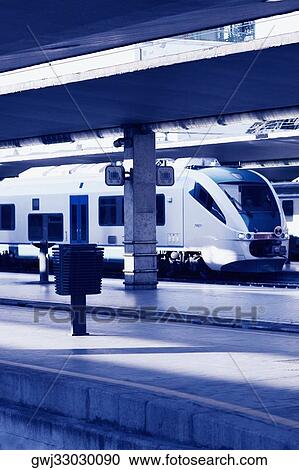 Train at a railroad station platform, Rome, Italy View Large Photo Image Stock Image - Train at a railroad station platform, Rome, Italy. Fotosearch