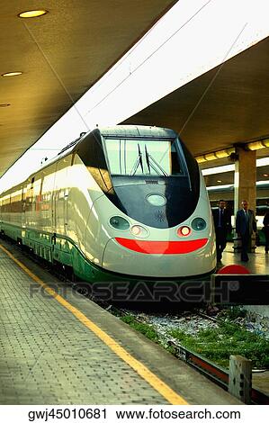 Train at a railroad station platform, Rome, Italy View Large Photo Image Stock Image - Train at a railroad station platform, Rome, Italy. Fotosearch