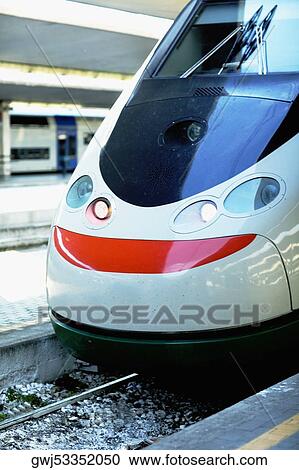 Train at a railroad station platform, Rome, Italy View Large Photo Image Stock Image - Train at a railroad station platform, Rome, Italy. Fotosearch