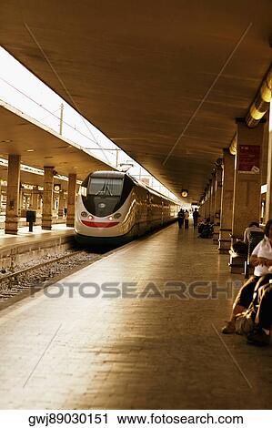 Train at a railroad station platform, Rome, Italy View Large Photo Image Stock Image - Train at a railroad station platform, Rome, Italy. Fotosearch