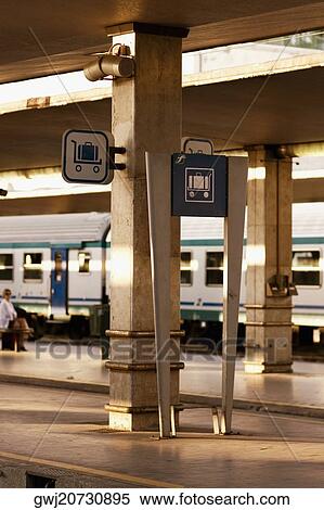 Train at a railroad station platform, Rome, Italy View Large Photo Image Stock Photography - Train at a railroad station platform, Rome, Italy. Fotosearch