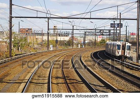 Train on railroad track View Large Photo Image Stock Photo - Train on railroad track. Fotosearch