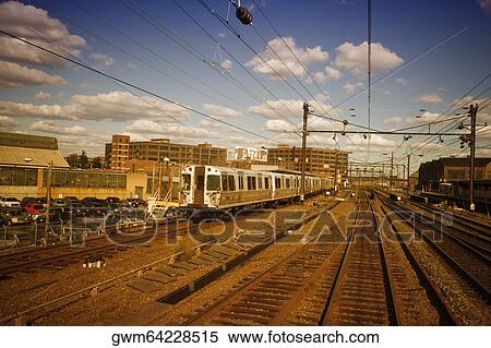 Train on railroad track View Large Photo Image Stock Photography - Train on railroad track. Fotosearch