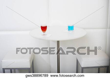 Stock Photo - Two glasses of cocktail on the table. Fotosearch