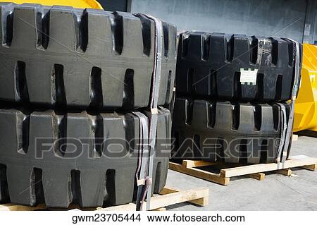 Vehicle tires at the shipping port View Large Photo Image Picture - Vehicle tires at the shipping port. Fotosearch