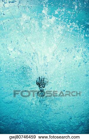 Water spraying from a fountain View Large Photo Image Stock Photo - Water spraying from a fountain. Fotosearch