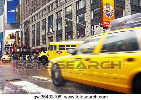 Yellow taxi on the road View Large Photo Image Stock Photography - Yellow taxi on the road. Fotosearch