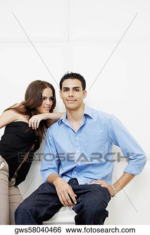 Young woman leaning on a young man's shoulder View Large Photo Image Stock Photograph - Young woman leaning on a young man's shoulder. Fotosearch