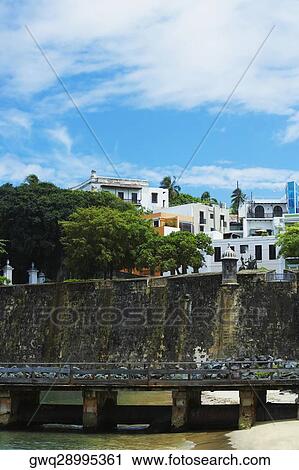 Buildings along a castle, Morro Castle, Old San Juan, San Juan, Puerto Rico View Large Photo Image Stock Image - Buildings along a castle, Morro Castle, Old San Juan, San Juan, Puerto Rico. Fotosearch