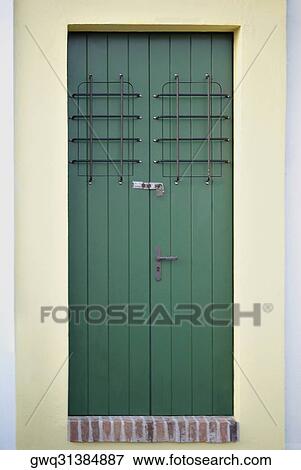 Close-up of a closed door of a building View Large Photo Image Stock Photo - Close-up of a closed door of a building. Fotosearch