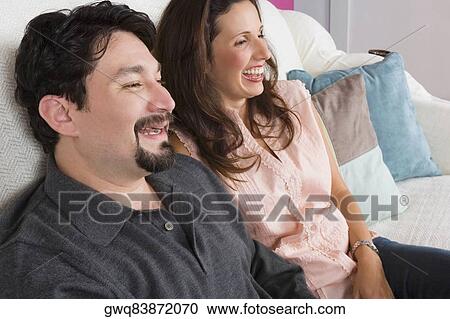 Close-up of a mid adult couple smiling View Large Photo Image Stock Image - Close-up of a mid adult couple smiling. Fotosearch