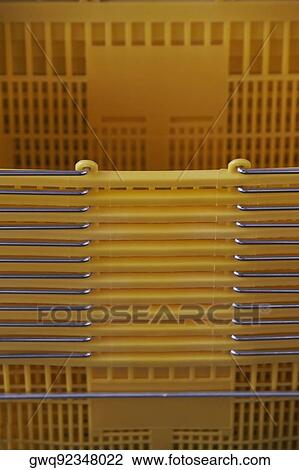 Stock Image - Close-up of a stack of shopping baskets. Fotosearch