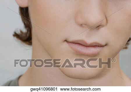 Close-up of a teenage boy View Large Photo Image Stock Image - Close-up of a teenage boy. Fotosearch