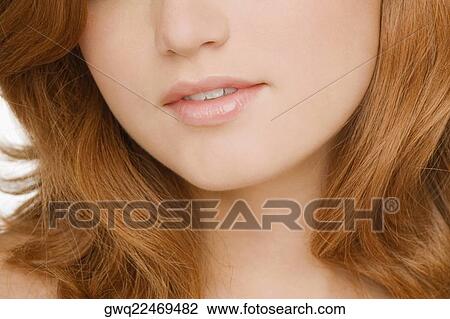 Close-up of a young woman's face View Large Photo Image Stock Image - Close-up of a young woman's face. Fotosearch