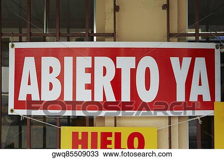 Close-up of an Open sign hanging from a store window View Large Photo Image Stock Image - Close-up of an Open sign hanging from a store window. Fotosearch