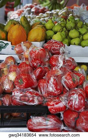 Close-up of fruits and vegetables at a market stall View Large Photo Image Picture - Close-up of fruits and vegetables at a market stall. Fotosearch