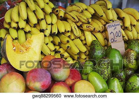 Stock Image - Close-up of fruits at a market stall. Fotosearch